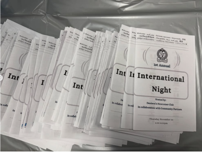 row of brochures that say International Night